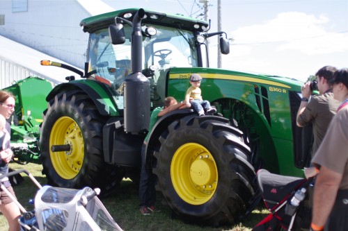 baby on tractor