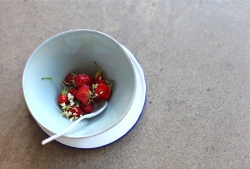 blue bowl of strawberries