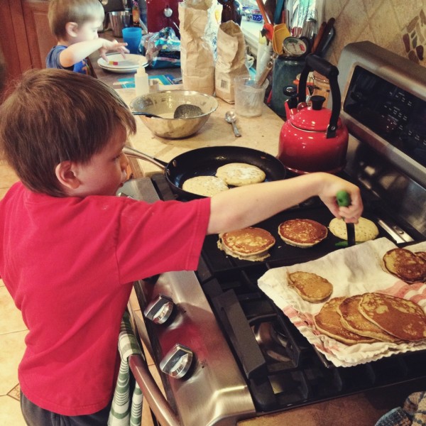 boys frying pancakes